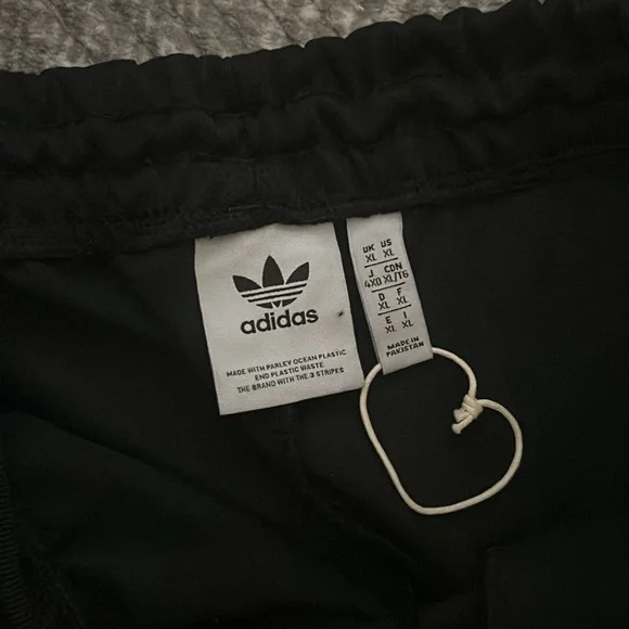 Women’s Adidas Three-stripes pants 
NWT 
XL - Picture 3 of 3